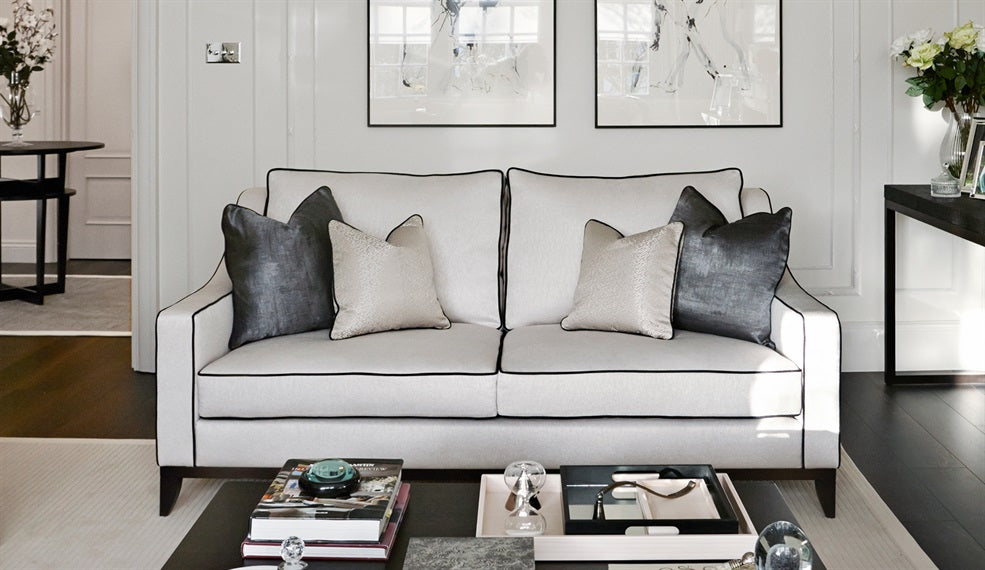 White Color Sofa Chair Bed with four Cushions in the hall