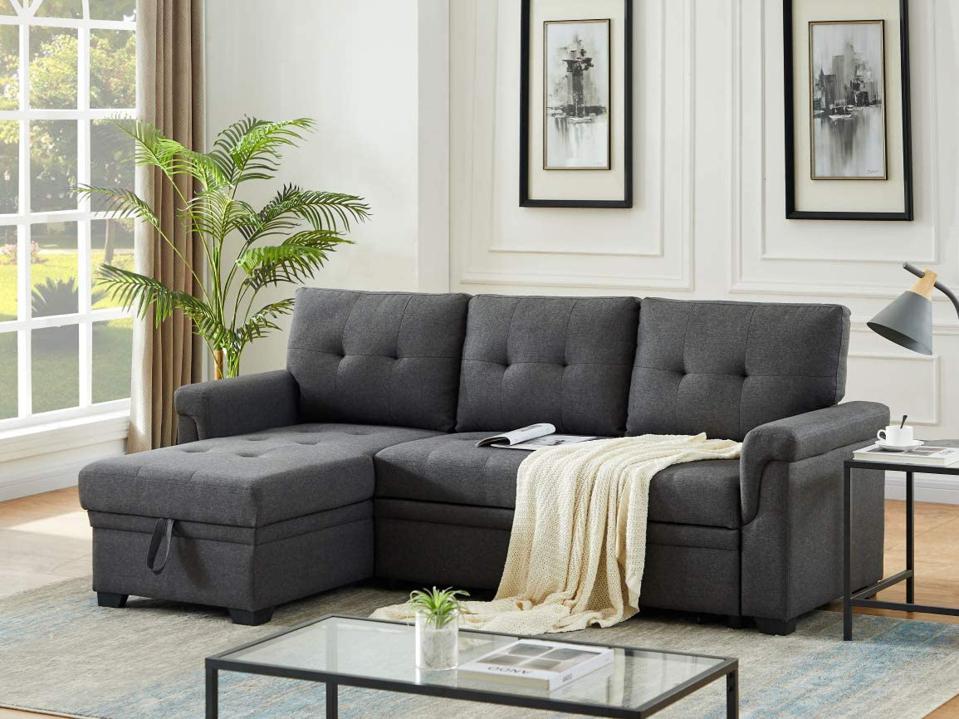 Dark Grey Sofa Bed with the blanket in hall