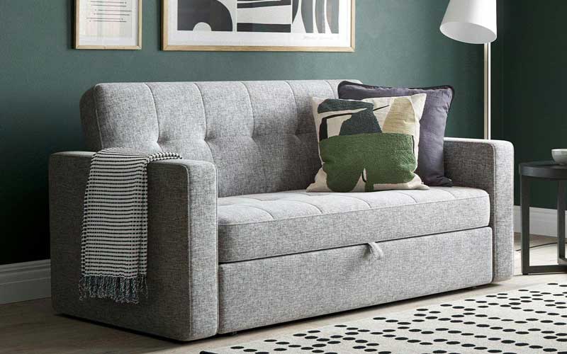 Grey Color Sofa Bed with two Cushions.