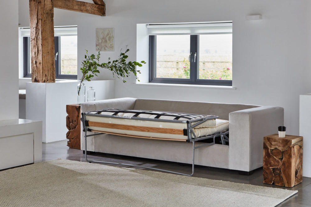 Light Grey Color Chair as a Bed in hall