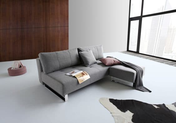 Grey Color Chair Bed in the living room.
