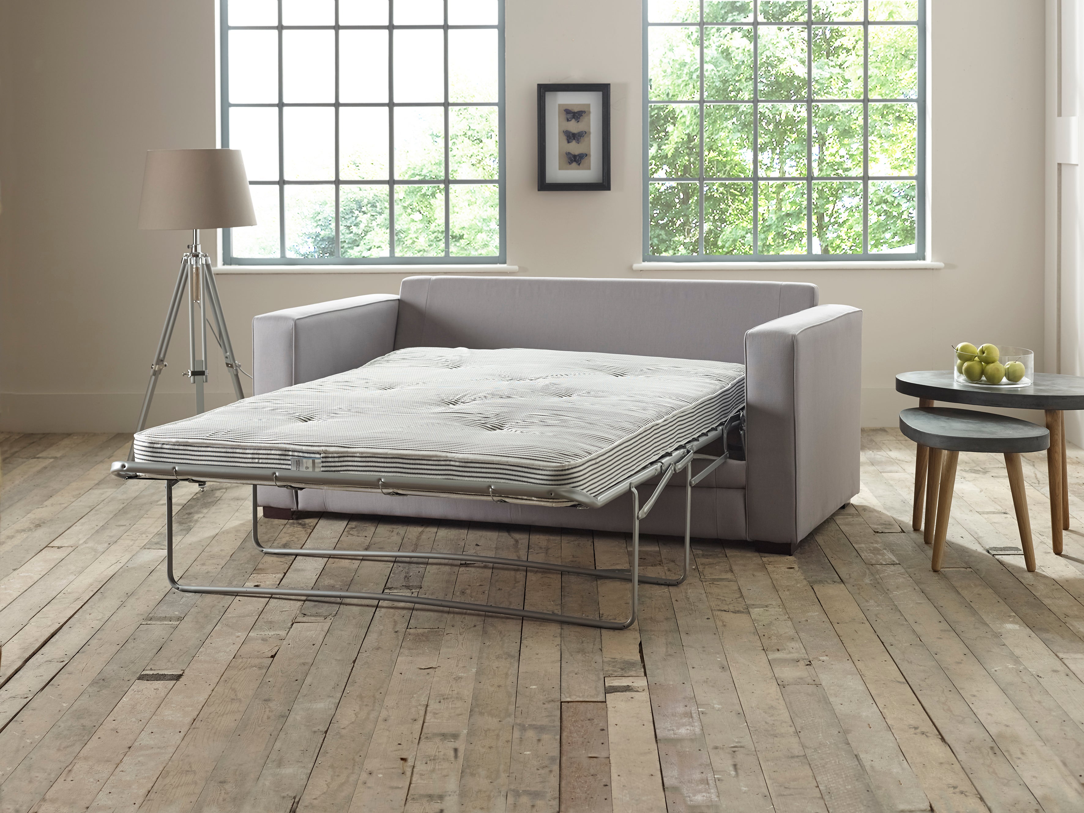 Light Grey Sofa Chair as a Bed in the Living Room