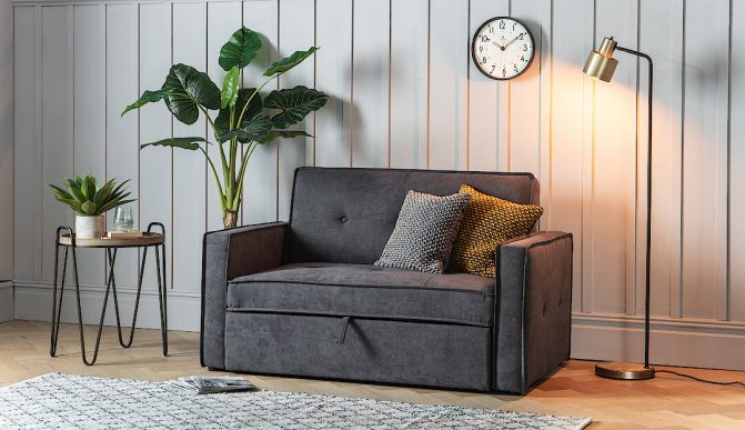 Dark Grey Chair Bed with a lamp in the Bedroom