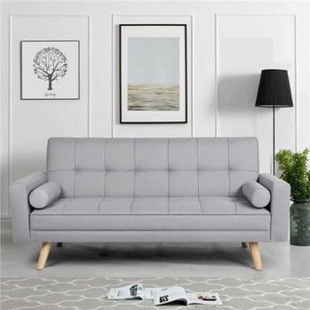 Carlee Fabric Click Clack Sofa Bed in Living Room